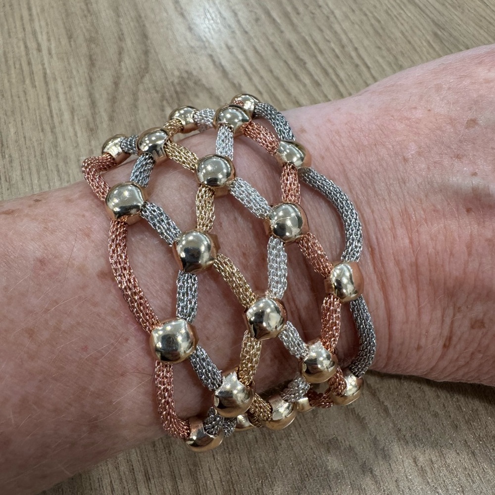 Elegant Gold and Silver Multi-Strand Bracelet